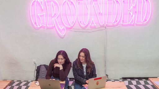 Photo of NMSU College of Business alumna Kendra Espiritu right at Grounded her family s locally owned business