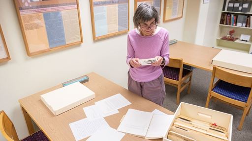 photo-of-lee-byrd-looking-through-bobby-byrd-s-collections-at-nmsu-archives-and-special-collections