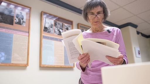 photo-of-lee-byrd-looking-through-bobby-byrd-s-collections-at-nmsu-archives-and-special-collections