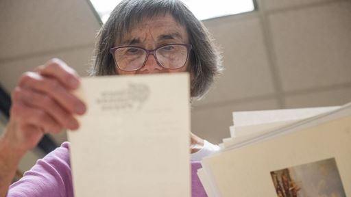 photo-of-lee-byrd-looking-through-bobby-byrd-s-collections-at-nmsu-archives-and-special-collections