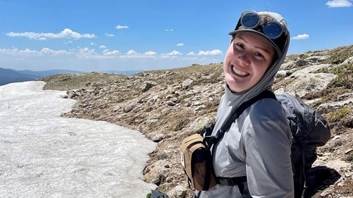 Whitney Watson a third year Ph D student searches for rosy finches on Big Costilla Peak at Vermejo Park Ranch