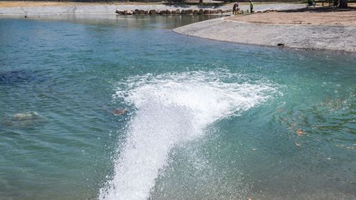 Photo of Alumni Pond restoration first fill NMSU photo by Josh Bachman