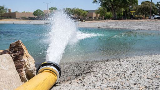 Photo of Alumni Pond restoration first fill NMSU photo by Josh Bachman