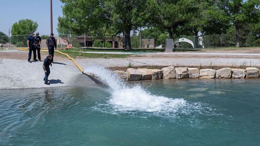 Photo of Alumni Pond restoration project getting first fill