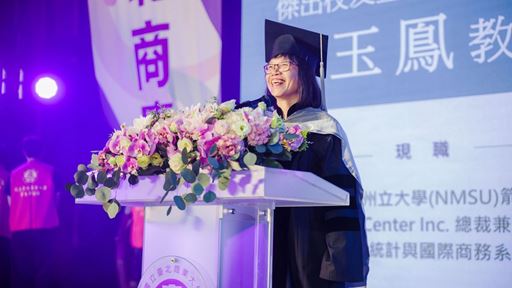 Photo of Winnie Lee being recognized at National Taipei University of Business
