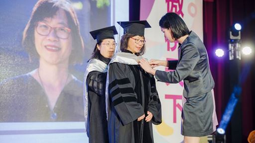 Photo of Winnie Lee being recognized at National Taipei University of Business