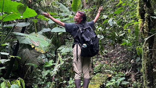 Photo of Alexis Olmos in Ecuador studying tropical insect ecology for a class
