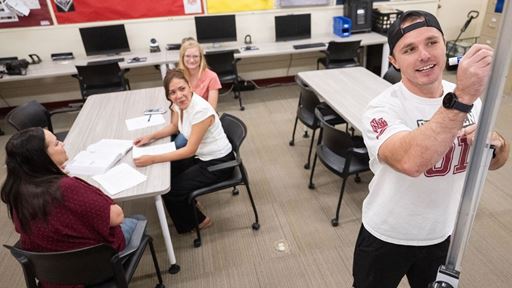 Photo of Blade Morris giving instruction to Adult Education students at the NMSU Grants campus