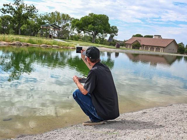 Photo of Alumni Pond during restock 2026