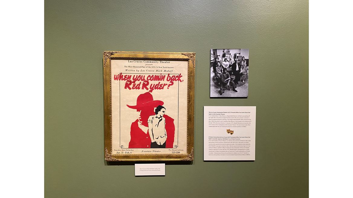 Poster and photo on a wall