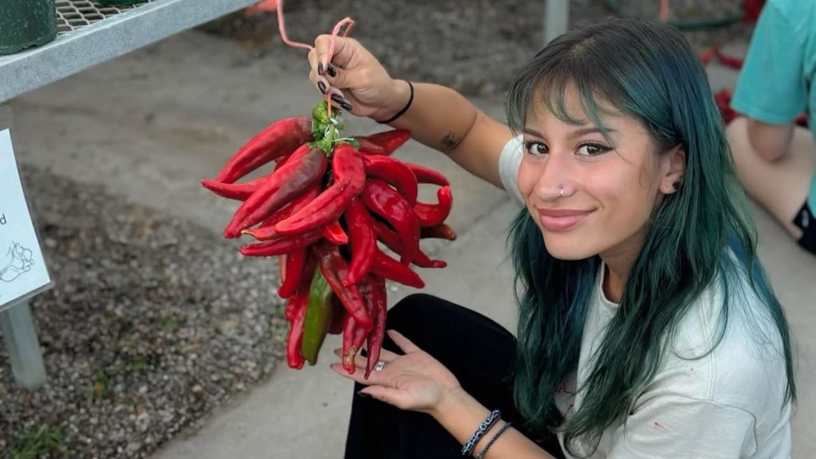 Photo of Alexis Olmos with chile