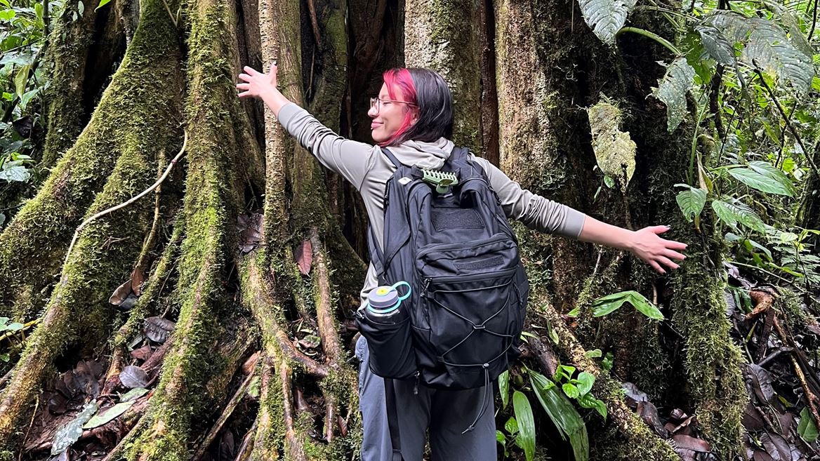 Photo of Alexis Olmos in Ecuador studying tropical insect ecology for a class