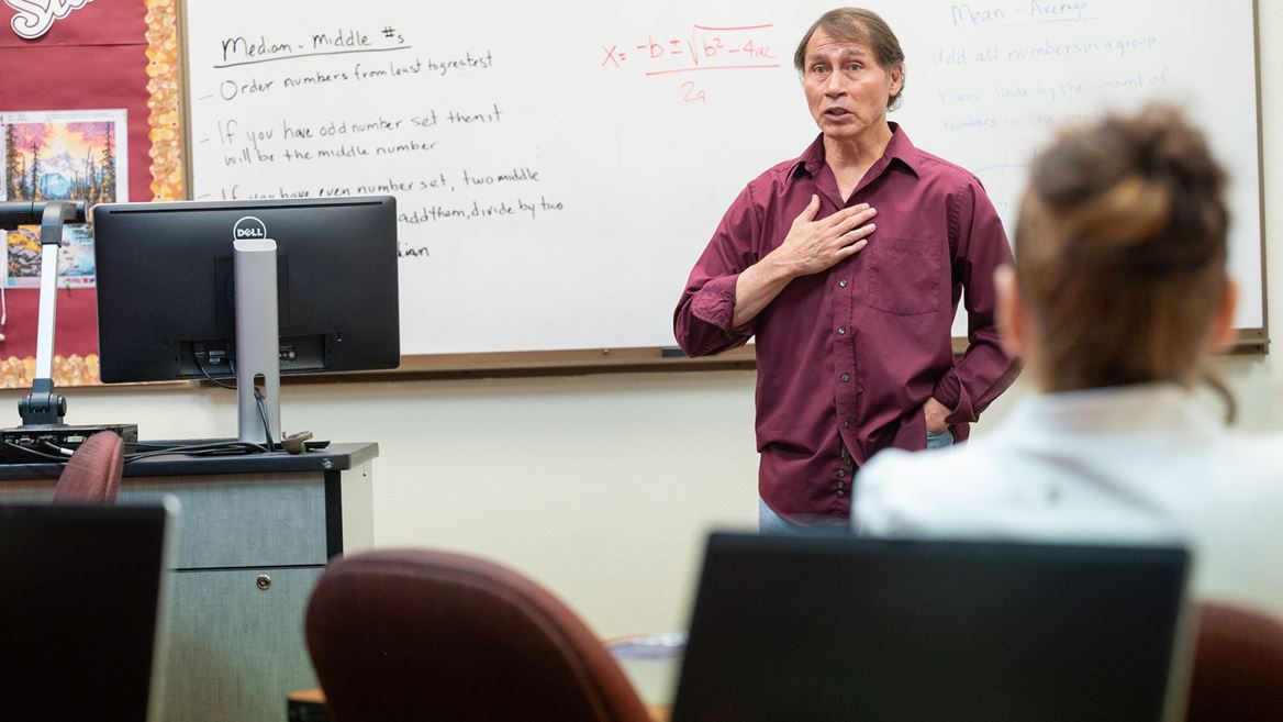 Photo of Ron Morales instructing students