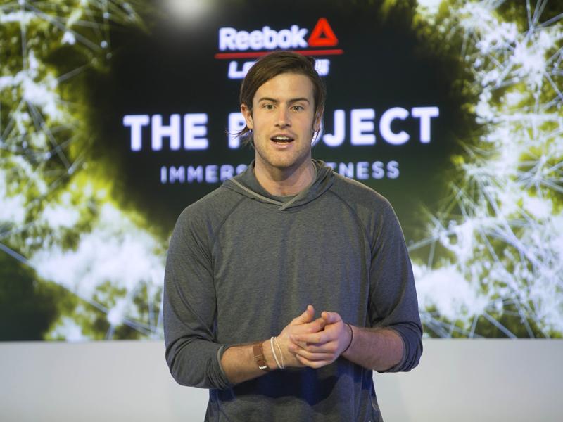 Reebok News Stream The Project Immersive Fitness Les Mills Jr Addressing Media On Stage