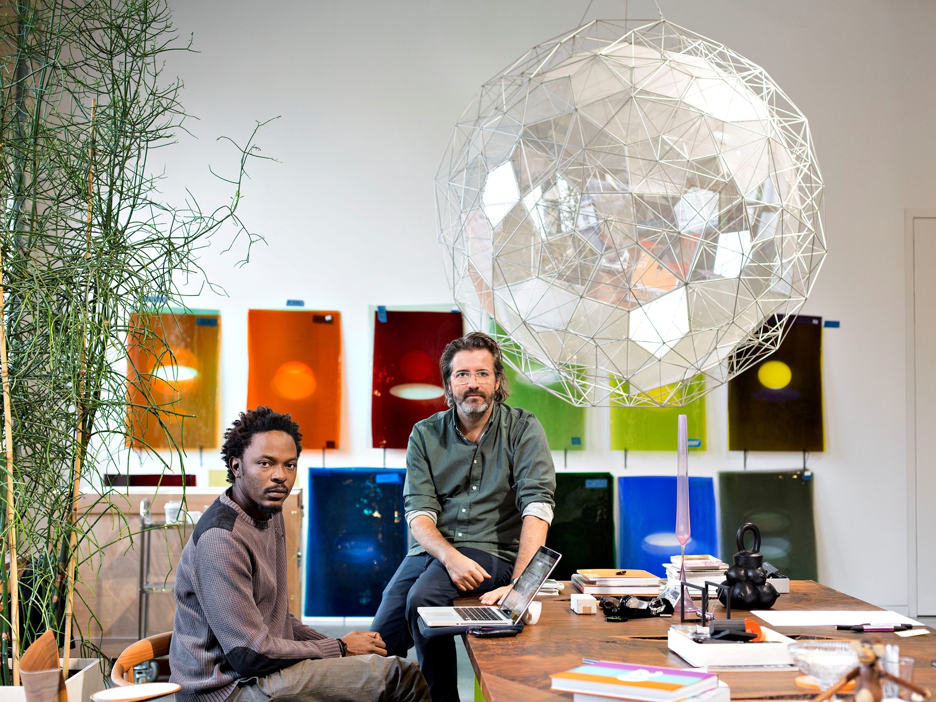 Mentor Olafur Eliasson (right) and protégé Sammy Baloji in Eliasson's studio  in Berlin.