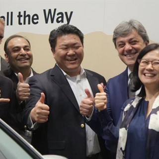 Executives from Samsung and SAP and the President of SEAT meet at the Mobile World Congress