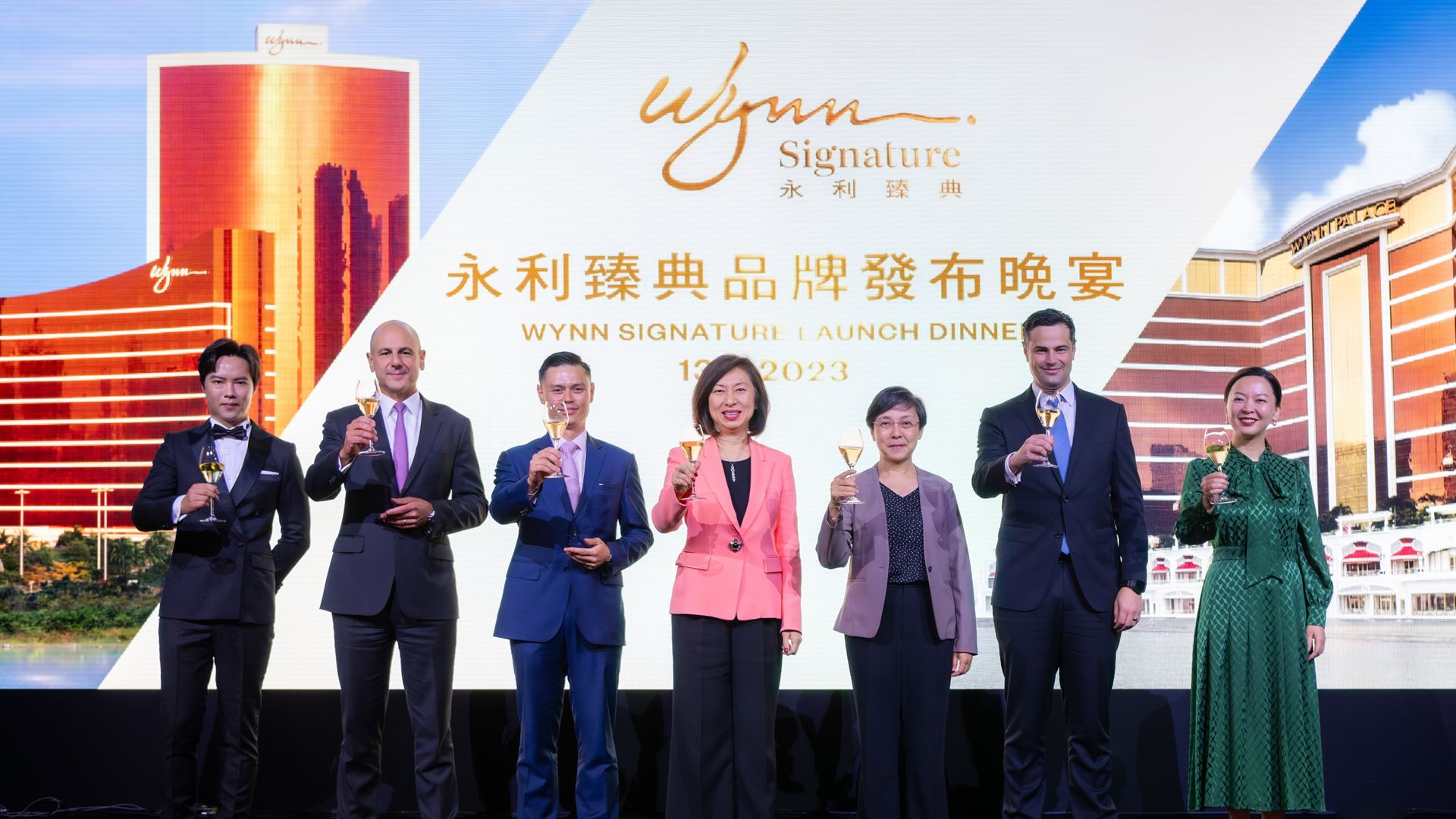 Officiating guests at the "Wynn Signature" launch dinner raise a toast to Wynn's new lifestyle brand