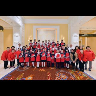 Tung Sing Tong primary students pose for a group picture, proud of a job well done