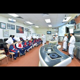 A group of excited youngsters gets to be junior master chefs for a day at Wynn Macau's F&B academy