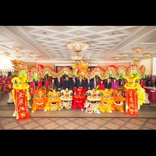 A group photo featuring Mr. Ian Michael Coughlan, President of Wynn Macau and the senior management team surrounded by t
