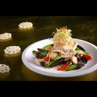 Stir-fried sliced lotus root, water chestnut and Cantonese preserved sausage – Wing Lei