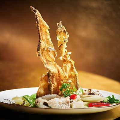 Wing Lei presents an auspicious Sautéed Macau sole fillet and crispy bones with black moss and truffle dish for Chinese