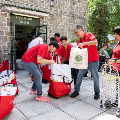 Wynn volunteers distribute food baskets to 373 underprivileged families