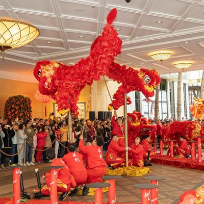 The lion dance teams danced to the beat of drums, local residents and visitors enjoyed watching the lively performances