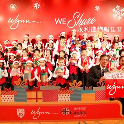 Mr Pun Chi Meng Secretary General of Caritas Macau receiving the gifts and handmade greeting cards from Mr Thomas L