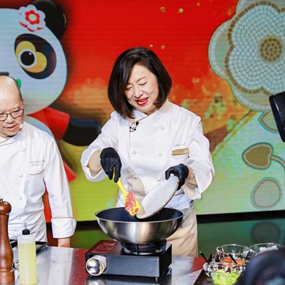 Senior executives demonstrate their culinary skills in the Executive Cooking Challenge