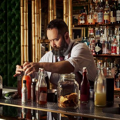 Left Mark Lloyd Director of Bars at Wynn Macau and Wynn Palace Right Wing Lei Bar interior