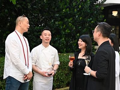 The Head Chefs from Wynn's award-winning restaurants exchange ideas  with guests at the celebratory cocktails