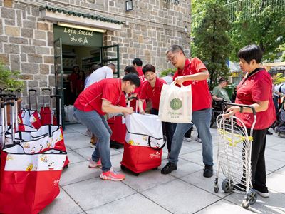 Wynn volunteers distribute food baskets to 373 underprivileged families