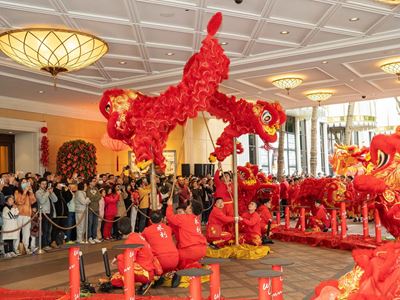 The lion dance teams danced to the beat of drums, local residents and visitors enjoyed watching the lively performances