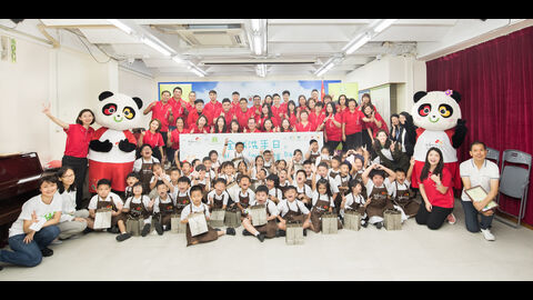 WE volunteers share their hygiene knowledge with local children at  Saint John De Brito School and Escola Tong Sin Tong