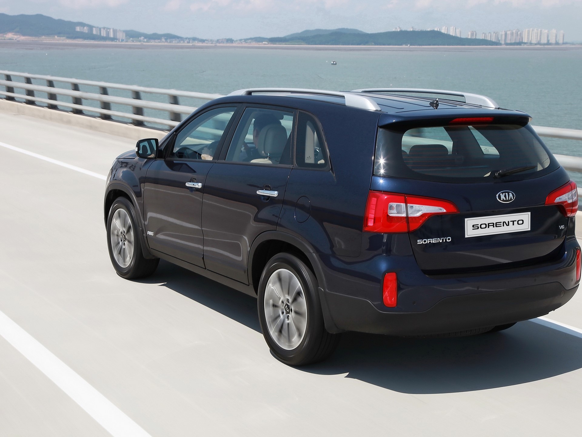 Upgraded Kia Sorento Driving (rear)
