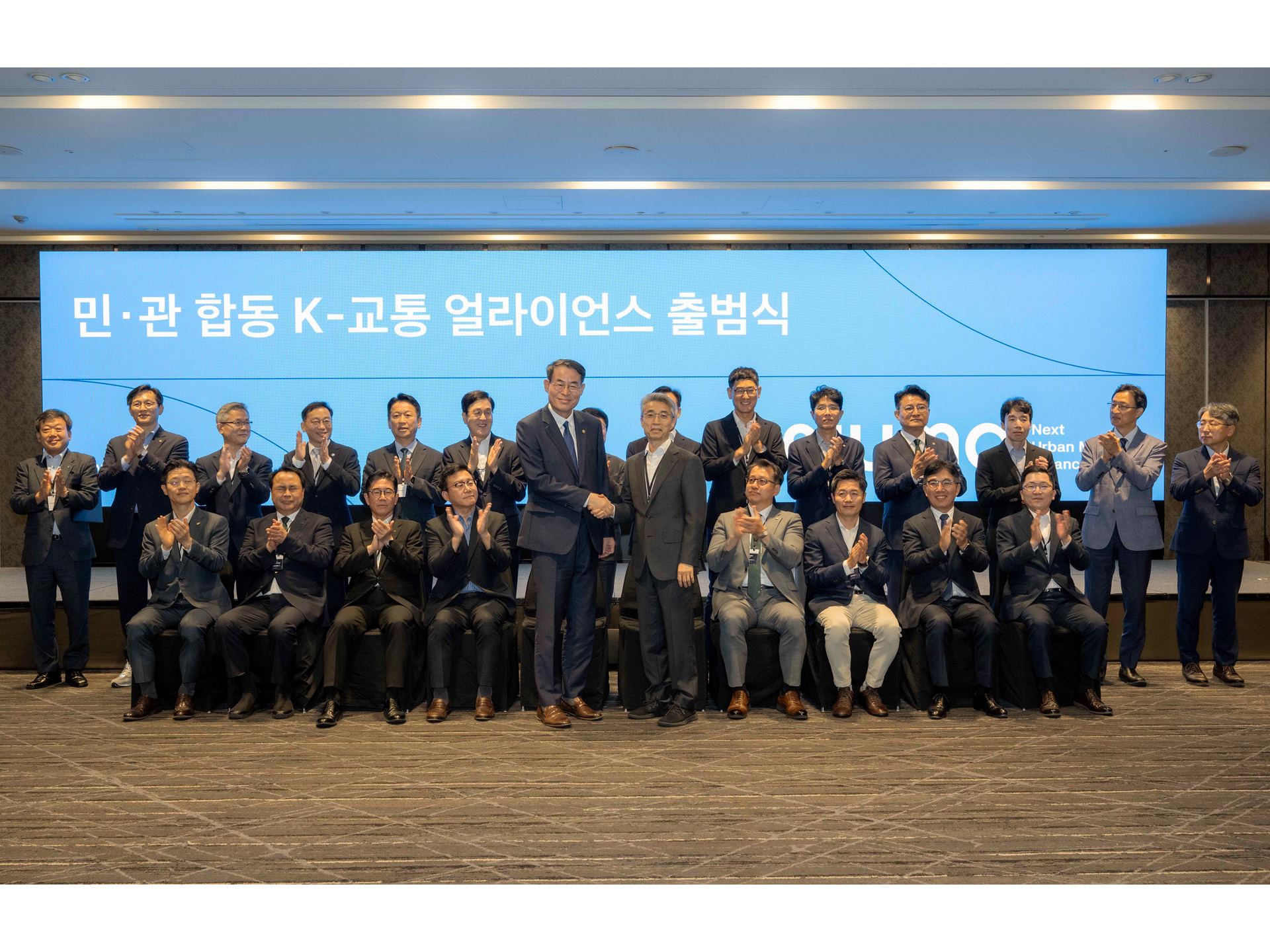 from left first row standing Hee up Kang South Korea s Vice Minister for Transport Chang Song President