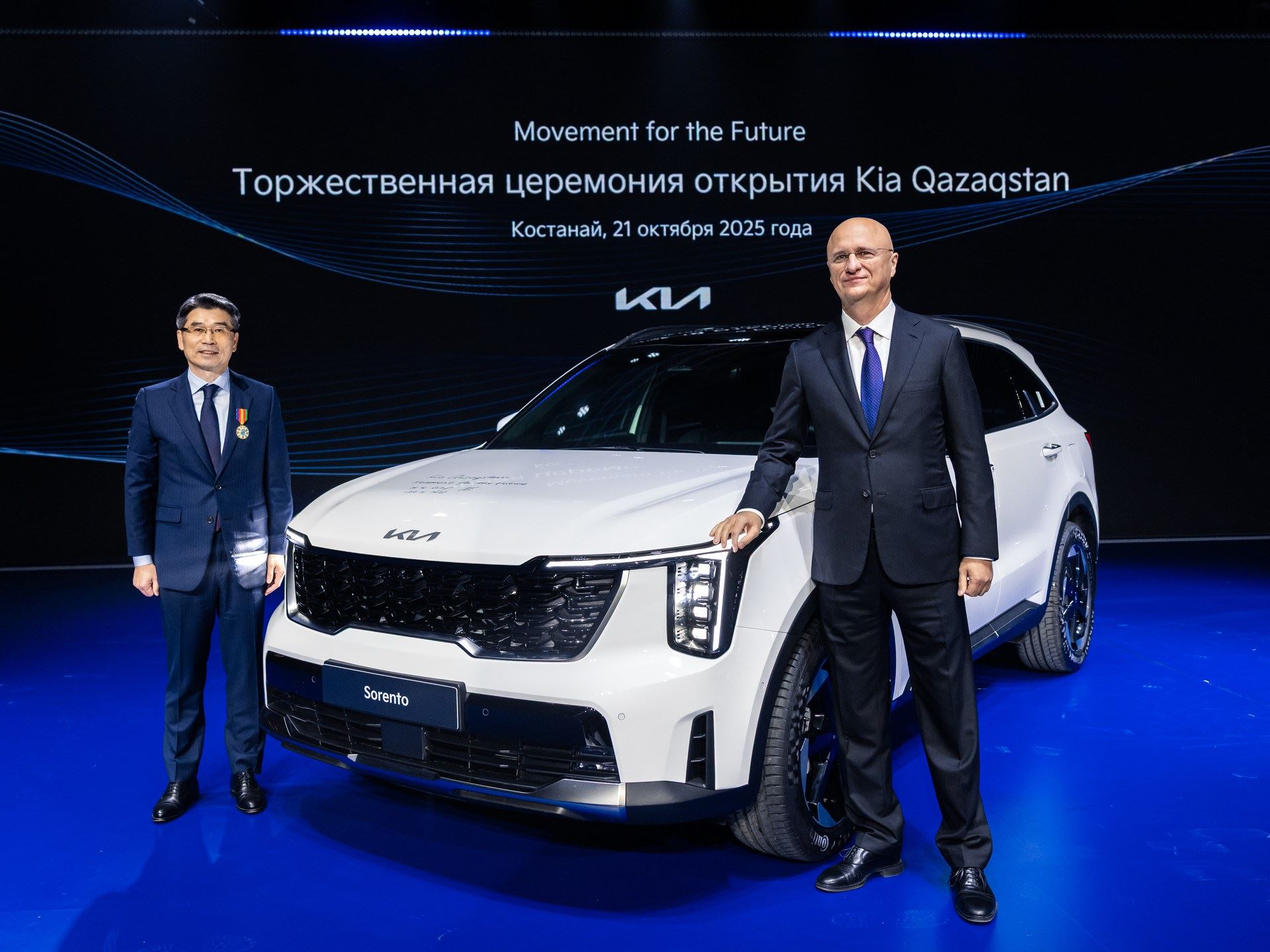 From left Ho Sung Song President and CEO of Kia Corporation and Roman Sklyar First Deputy Prime Minister of the Rep