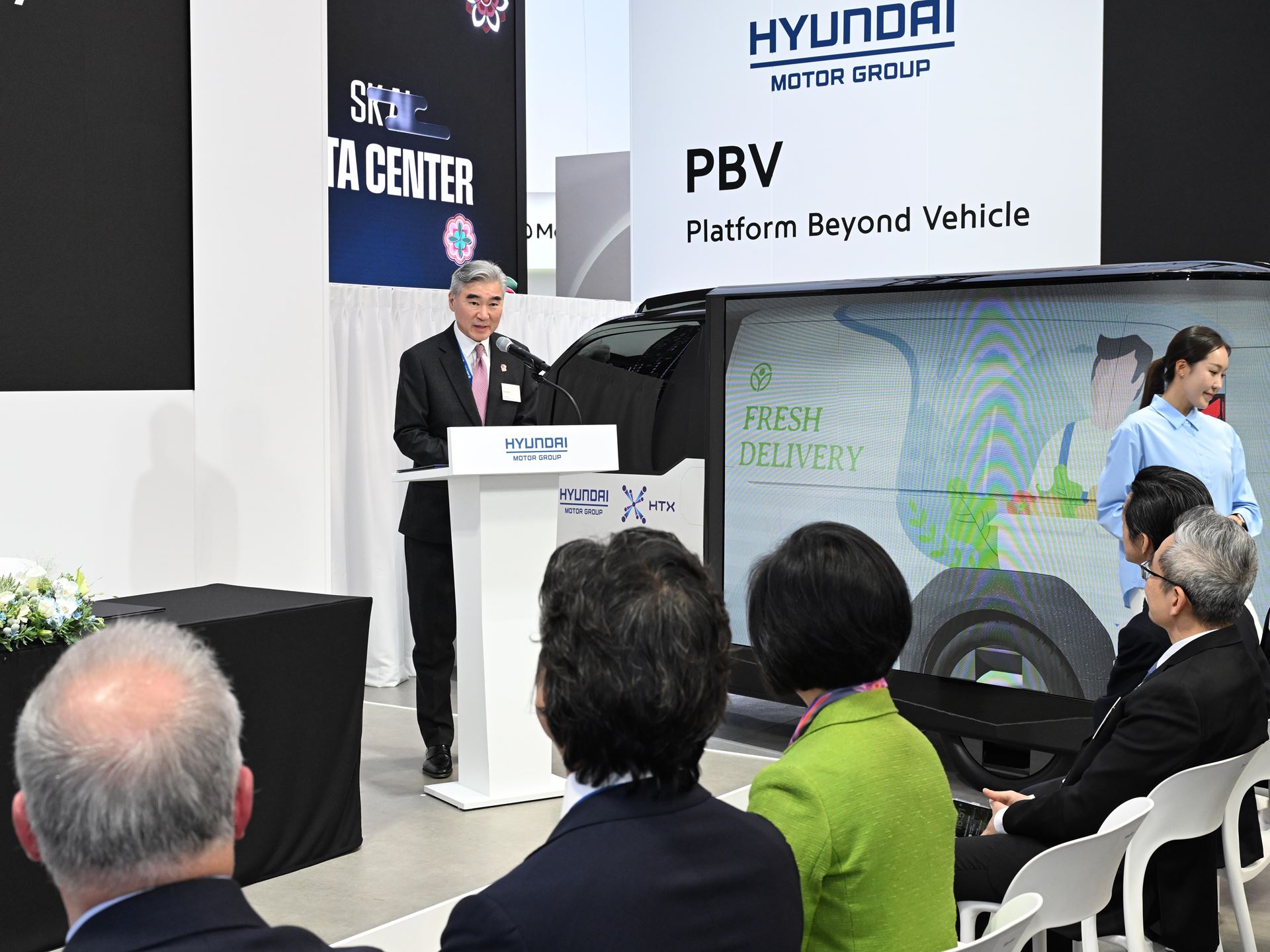Sung Kim President for Strategic Planning at Hyundai Motor Group is delivering a speech at the MoU signing ceremony