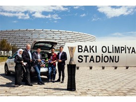 Participants pose at a handover ceremony of football boots to Jordan’s Za’atari Refugee Camp
