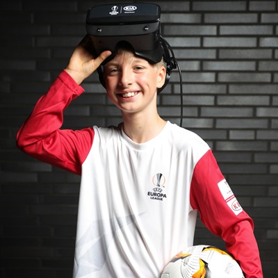 10-year-old Justus tries on the Official Match Ball Carrier kit and VR headset