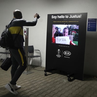 Justus greets one of the players of the two finalist teams at the 2019/20 UEFA Europa League Final as they arrive...