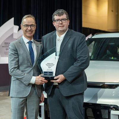AJAC Award Acceptance Evan Willams with Kia Canada Director of Marketing Michael Kopke