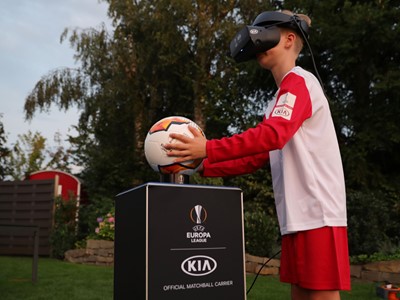 Justus virtually carries the Official Match Ball onto the pitch ahead of the UEFA Europa League final