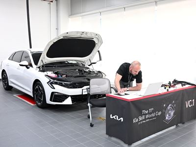 Kia Skill World Cup participant is taking vehicle practical test at Kia Osan Training Center, Korea