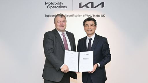 from left Andrew Miller CEO of Motability Operations and Ho Sung Song President and CEO of Kia Corporation