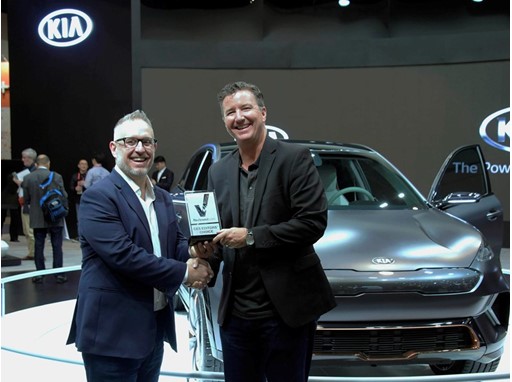(From left) Chris Lloyd (General Manager at Reviewed.com), James Bell (Director at Kia Motors America)