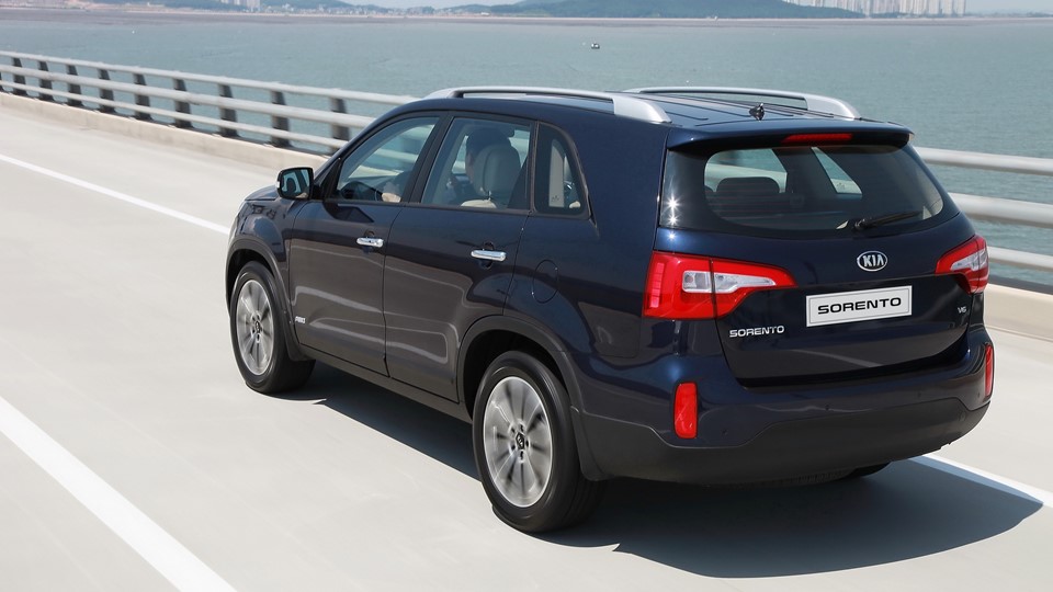 Upgraded Kia Sorento Driving (rear)