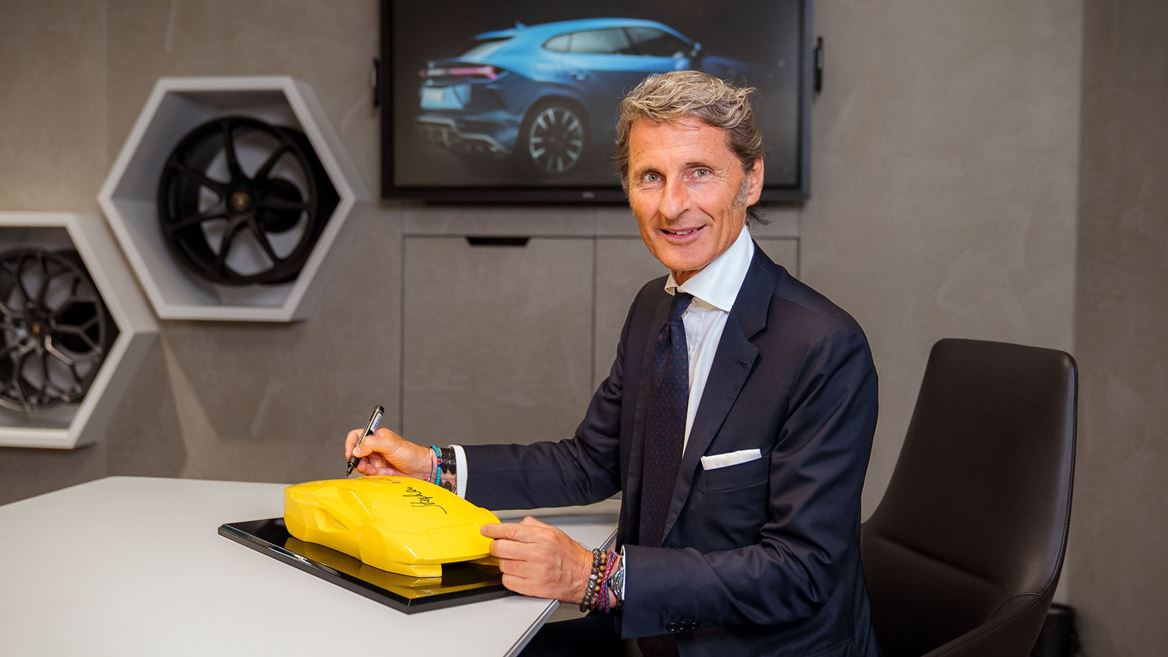 Stephan Winkelmann signing the inaugurtion present at Grand Opening ...
